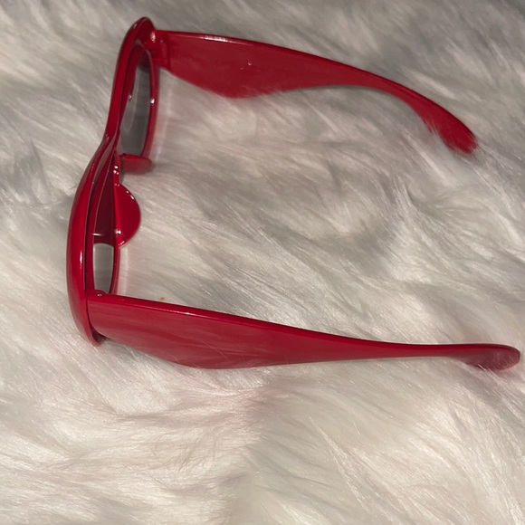 Red sunglasses (brand new) comes with a case. - Picture 1 of 2
